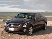 2015 Cadillac ATS Coupe brown view on beach
